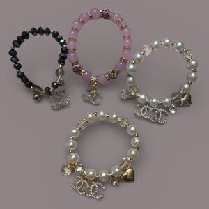 Black, Pink, and Pearl Charm Bracelets you pick one